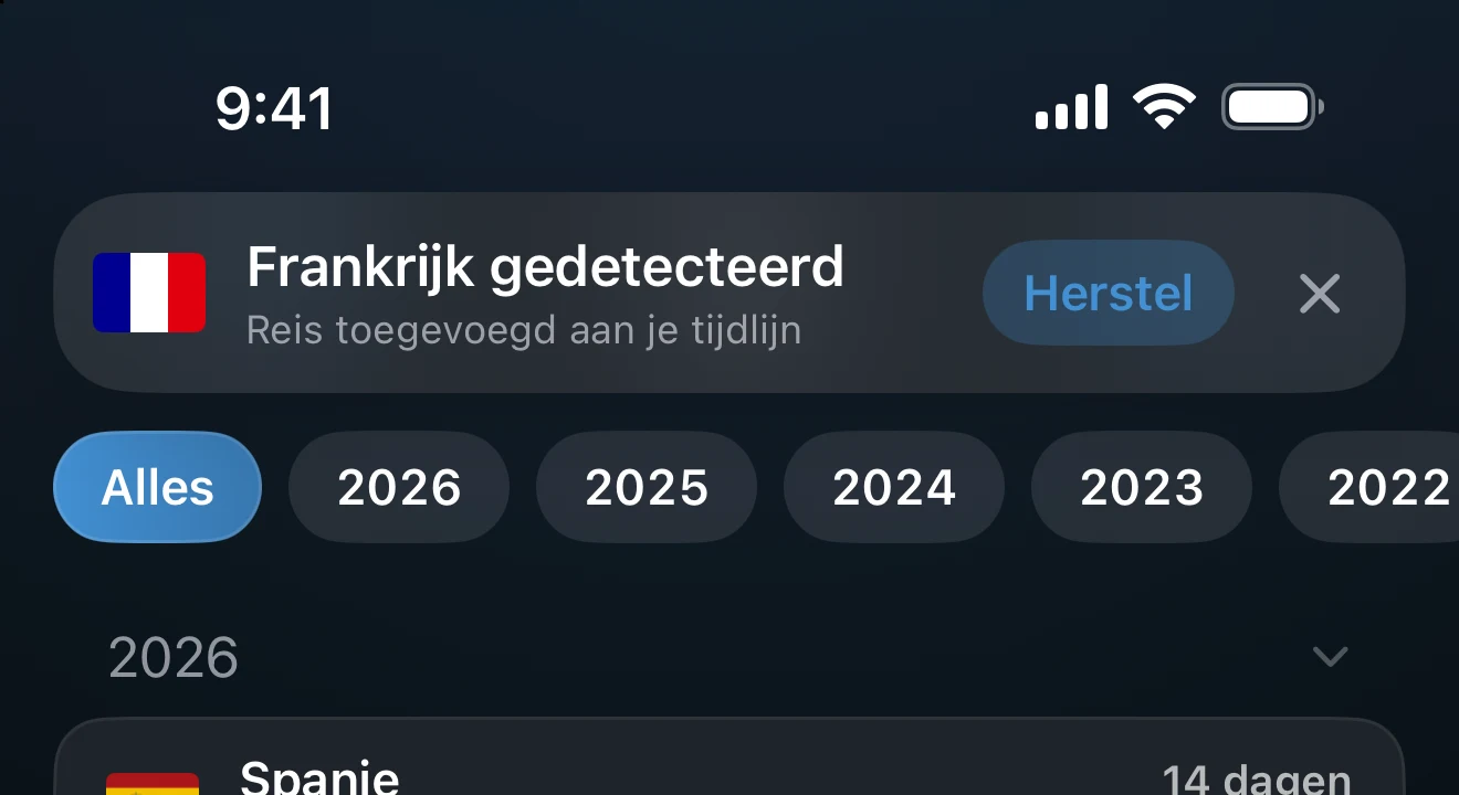 Banner in de app die een gedetecteerd land meldt met een knop Herstel