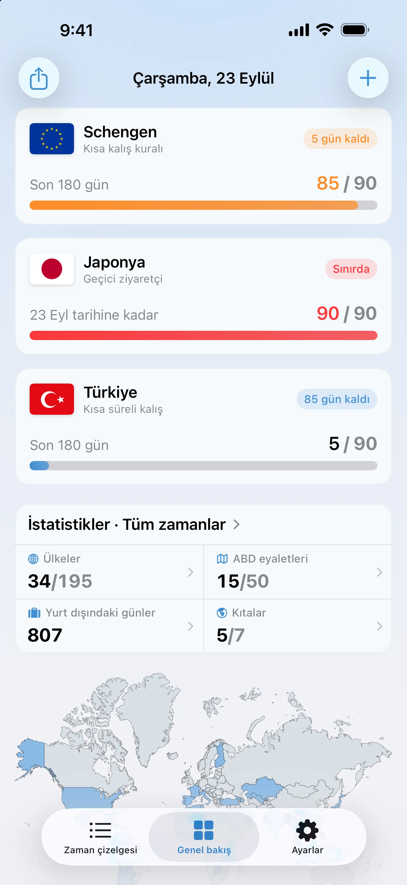 Üç vize takibi olan AtlasDays genel bakış ekranı: 90 günün 85'inde turuncu Schengen, sınırında kırmızı bir Japonya geçici ziyaretçi kalışı ve 90 günün 5'inde Türkiye