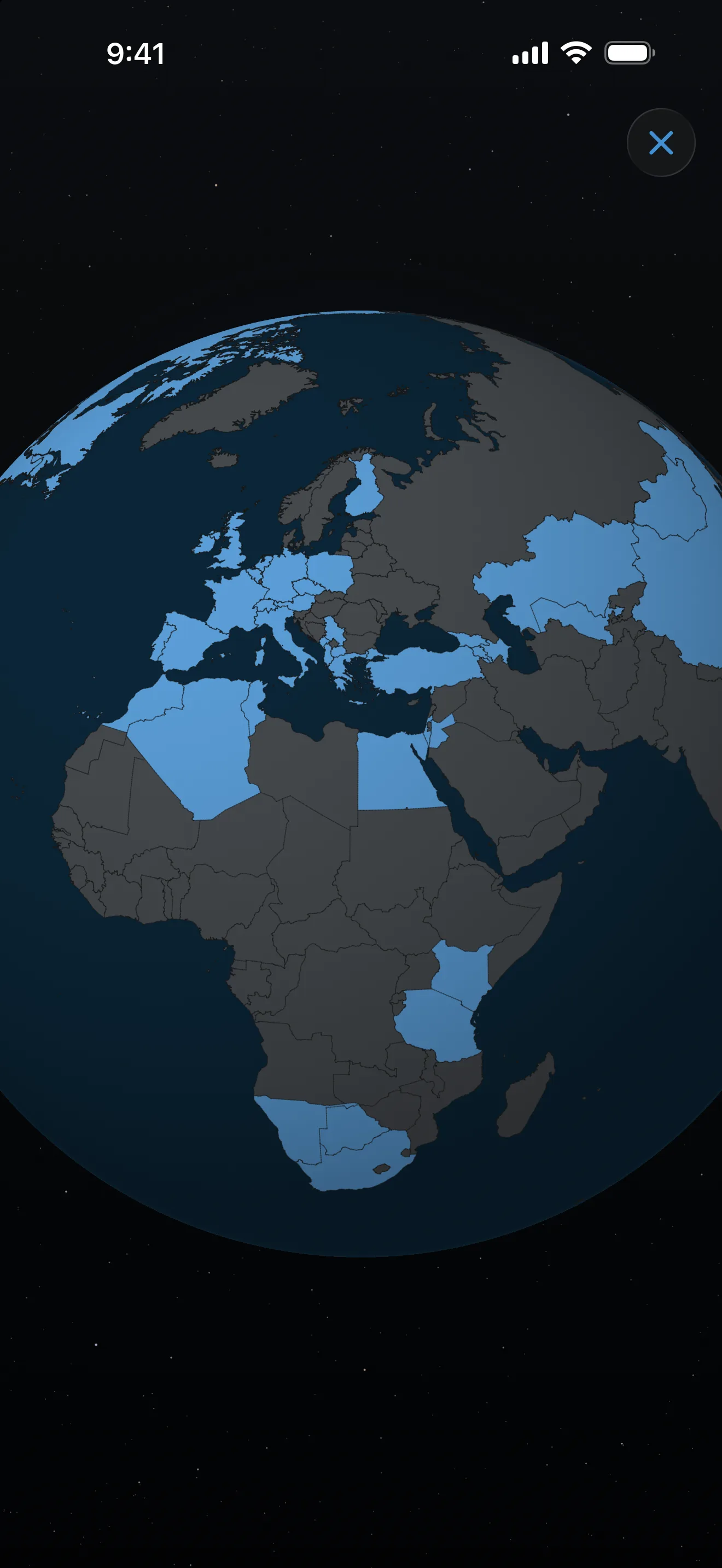 The AtlasDays 3D globe turned to Europe, Africa, and Central Asia, with every visited country lit in blue