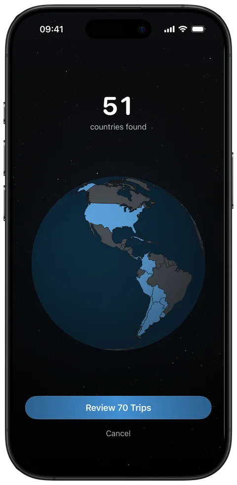 Photo import on iPhone: 51 countries found in the photo library, shown on a globe, with 70 trips to review